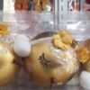 adorno de bolas-diseno-de-audífonos-10cm-dorado.jpeg